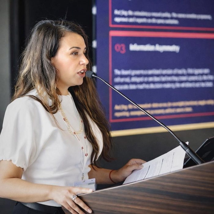 Elina Moshkovich speaking at conference